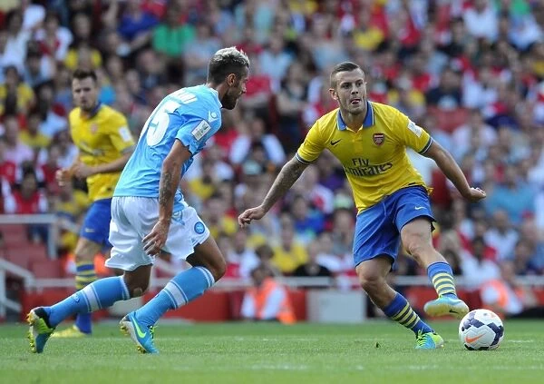 Arsenal's Jack Wilshere Fends Off Napoli's Valon Behrami in 2013-14 Emirates Cup Clash