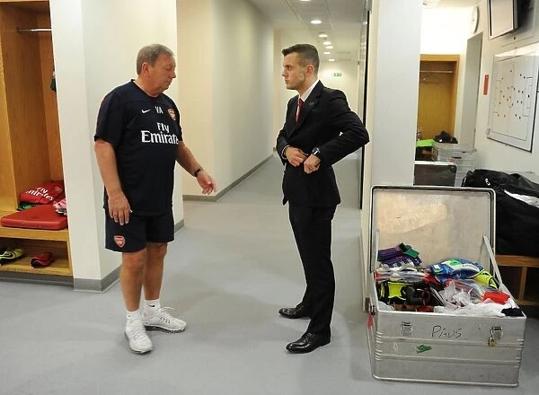Arsenal's Jack Wilshere and Kit Man Vic Akers Before Arsenal v Liverpool (2013-14)