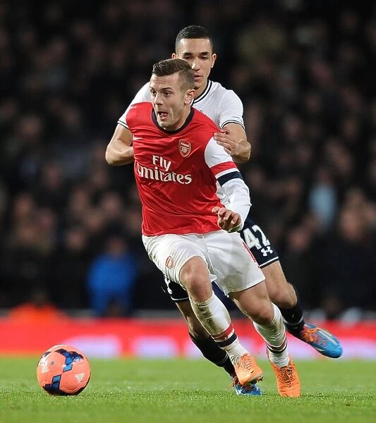 Arsenal's Jack Wilshere Outmaneuvers Tottenham's Nabil Bentaleb in FA Cup Clash