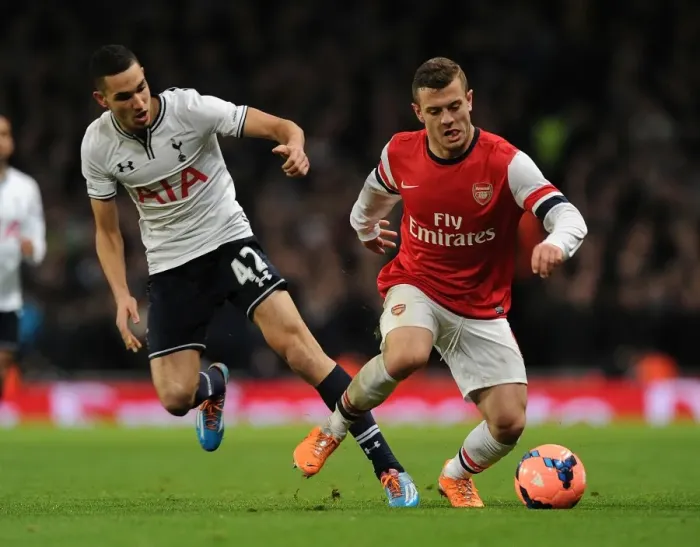 Framed Print : Arsenal's Jack Wilshere Overpowers Tottenham's Bentaleb in FA Cup Battle Framed Print : Arsenal's Jack Wilshere Overpowers Tottenham's Bentaleb in FA Cup Battle
