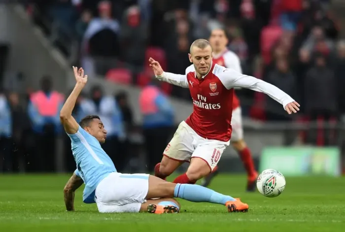 Framed Print : Arsenal's Jack Wilshere Tackled by Manchester City's Danilo in Carabao Cup Final Showdown