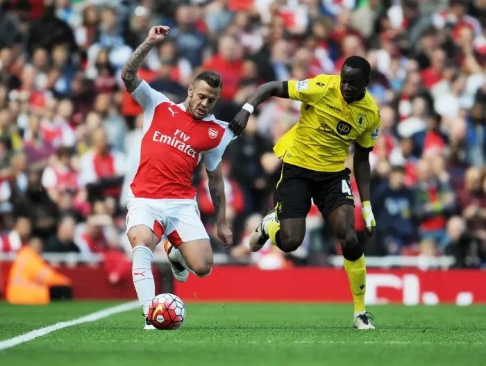 Framed Print : Arsenal's Jack Wilshere vs. Aly Cissokho: A Premier League Showdown at Emirates Stadium Framed Print : Arsenal's Jack Wilshere vs. Aly Cissokho: A Premier League Showdown at Emirates Stadium