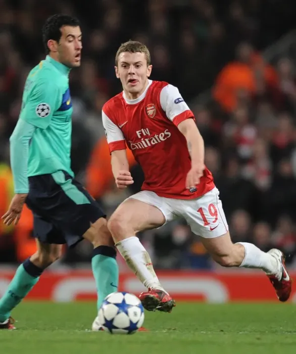 Framed Print : Arsenal's Jack Wilshere vs Barcelona's Sergio Busquets: A Battle in the Arsenal 2:1 Victory, UEFA Champions League, Emirates Stadium, 2011