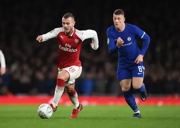 Framed Print : Arsenal's Jack Wilshere vs. Chelsea's Ross Barkley: A Battle in the Carabao Cup Semi-Finals Framed Print : Arsenal's Jack Wilshere vs. Chelsea's Ross Barkley: A Battle in the Carabao Cup Semi-Finals