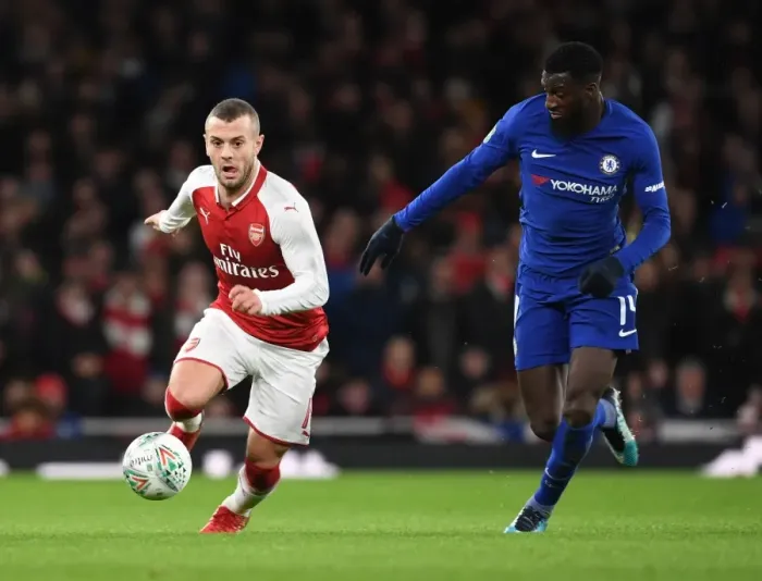 Framed Print : Arsenal's Jack Wilshere vs. Chelsea's Tiemoue Bakayoko: A Carabao Cup Semi-Final Battle Framed Print : Arsenal's Jack Wilshere vs. Chelsea's Tiemoue Bakayoko: A Carabao Cup Semi-Final Battle