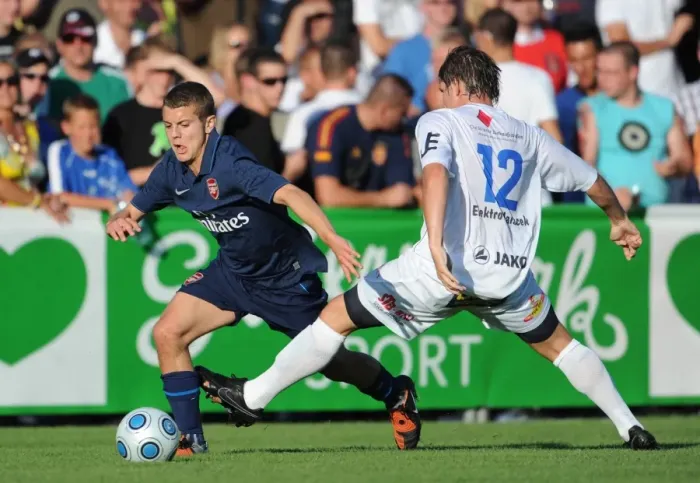 Framed Print : Arsenal's Jack Wilshere vs. SC Columbia's Alexander Frimmel: A Pre-Season Clash in Vienna, 2009 Framed Print : Arsenal's Jack Wilshere vs. SC Columbia's Alexander Frimmel: A Pre-Season Clash in Vienna, 2009