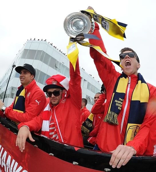 Arsenal's Jack Wilshere and Wojciech Szczesny Celebrate FA Cup Victory