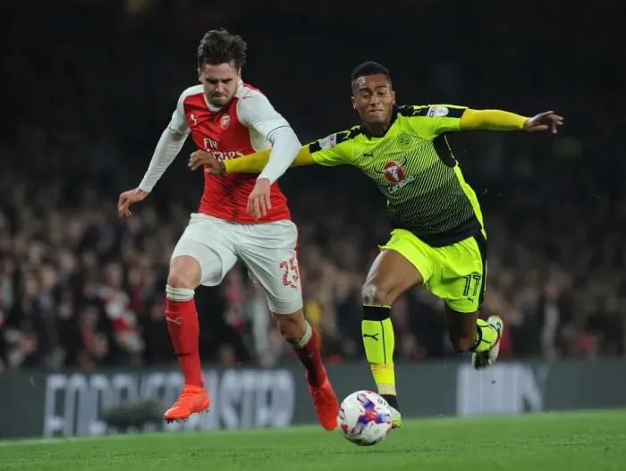 Framed Print : Arsenal's Jenkinson Clashes with Reading's Wieser in EFL Cup Battle