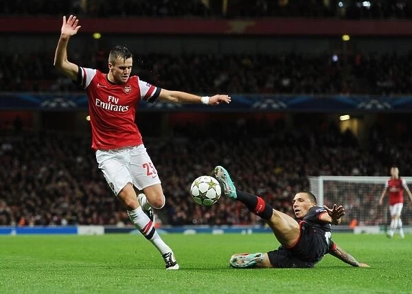 Arsenal's Jenkinson Outmaneuvers Olympiacos Holebas in Champions League Clash