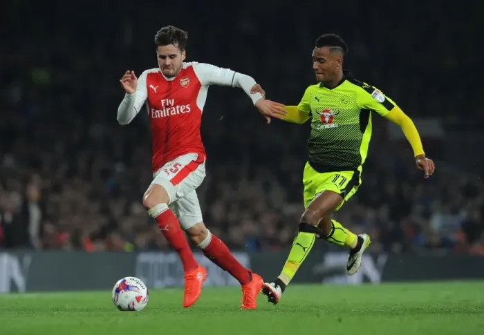 Framed Print : Arsenal's Jenkinson vs. Reading's Wieser: A Fierce EFL Cup Showdown