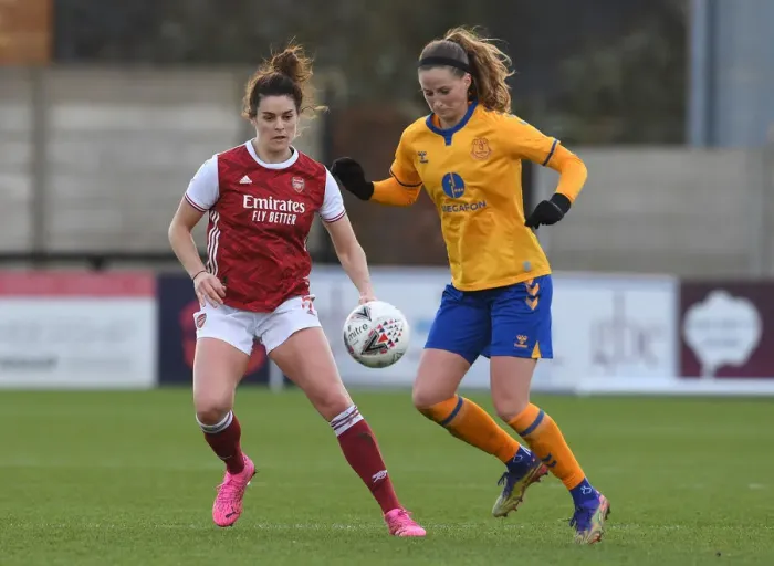Framed Print : Arsenal's Jennifer Beattie Shuts Down Everton's Nicoline Sorensen in FA WSL Clash