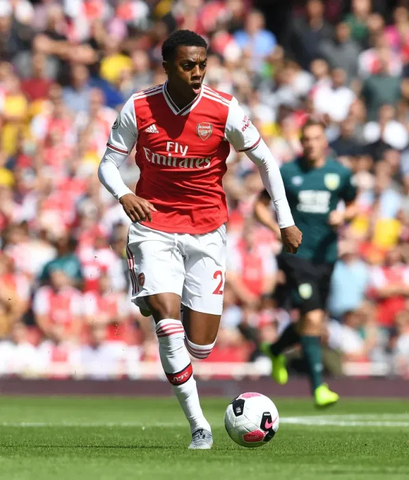 Framed Print : Arsenal's Joe Willock in Action against Burnley: 2019-20 Premier League Showdown at Emirates Stadium