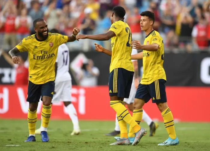 Framed Print : Arsenal's Joe Willock and Alexandre Lacazette Celebrate Goal in 3-0 International Champions Cup Win