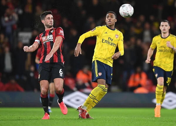 Arsenal's Joe Willock and Andrew Surman Clash in Intense FA Cup Fourth Round Match