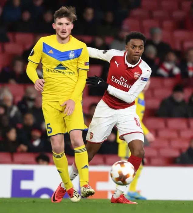 Framed Print : Arsenal's Joe Willock Clashes with BATE's Dmitri Baga in Europa League Showdown Framed Print : Arsenal's Joe Willock Clashes with BATE's Dmitri Baga in Europa League Showdown