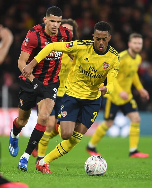 Arsenal's Joe Willock Clashes with Bournemouth's Dominic Solanke in FA Cup Fourth Round