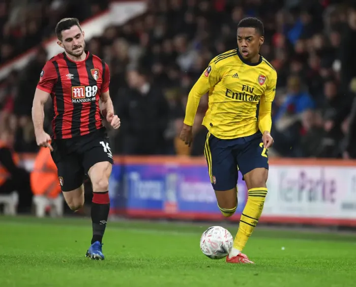 Framed Print : Arsenal's Joe Willock Clashes with Bournemouth's Lewis Cook in FA Cup Fourth Round