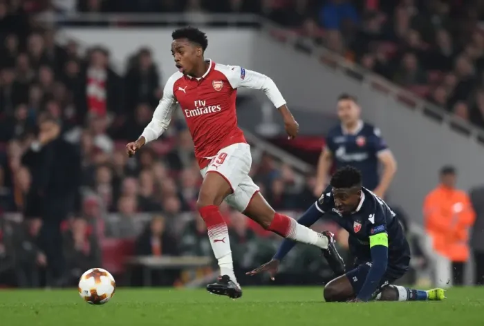 Framed Print : Arsenal's Joe Willock Clashes with Crvena Zvezda's Mitchell Donald in Europa League Showdown Framed Print : Arsenal's Joe Willock Clashes with Crvena Zvezda's Mitchell Donald in Europa League Showdown