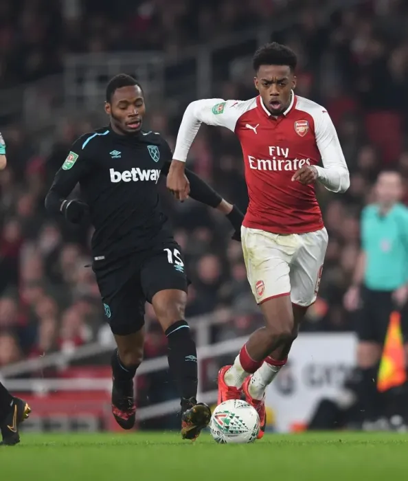 Framed Print : Arsenal's Joe Willock Clashes with West Ham's Diafra Sakho in Carabao Cup Quarterfinal
