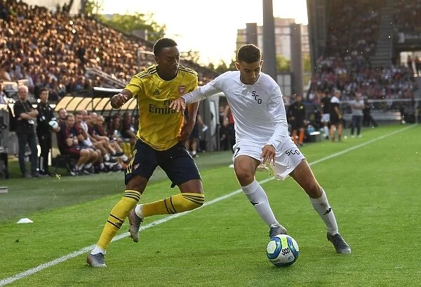 Arsenal's Joe Willock Faces Off Against Angers Rachid Alioui in 2019 Pre-Season Friendly
