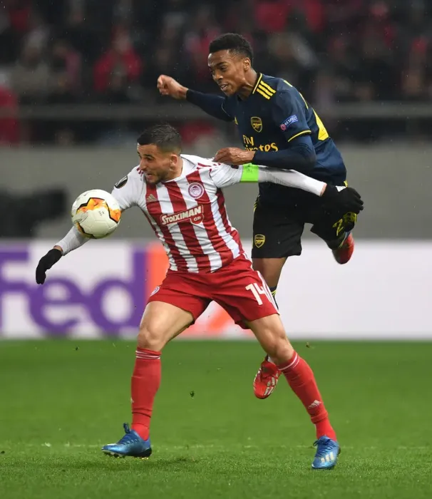 Framed Print : Arsenal's Joe Willock Faces Off Against Olympiacos Omar Elabdellaoui in Europa League Clash Framed Print : Arsenal's Joe Willock Faces Off Against Olympiacos Omar Elabdellaoui in Europa League Clash