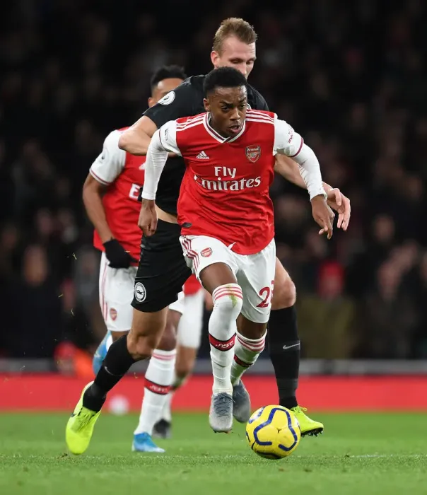Framed Print : Arsenal's Joe Willock Outsmarts Dan Burn: A Premier League Tactical Battle