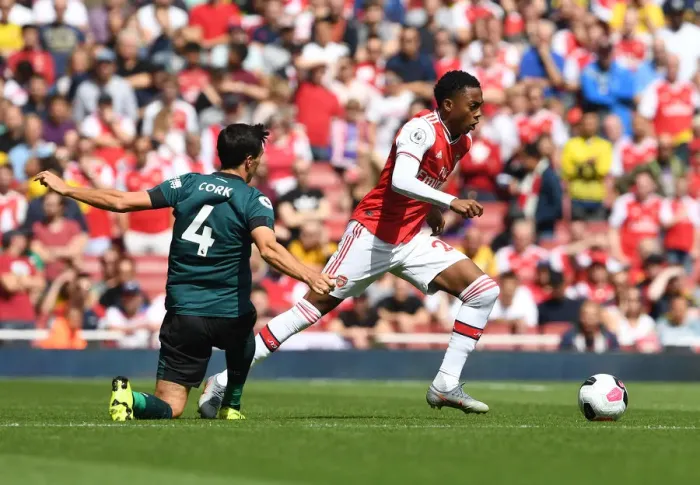 Framed Print : Arsenal's Joe Willock Outwits Jack Cork: A Premier League Battle at Emirates Stadium
