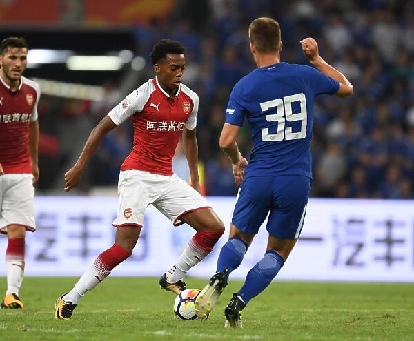 Arsenal's Joe Willock vs. Chelsea's Mario Pasalic: A Clash of Young Talents in Arsenal vs. Chelsea Pre-Season 2017-18, Beijing