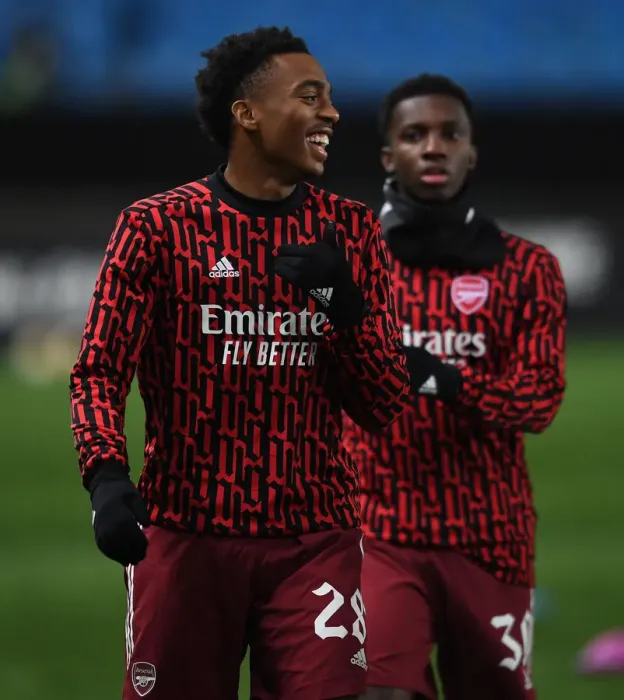 Framed Print : Arsenal's Joe Willock Warming Up Ahead of Molde FK Clash in Europa League