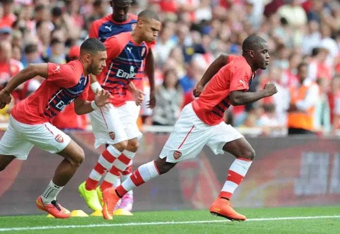Framed Print : Arsenal's Joel Campbell Faces Off Against Benfica at the Emirates Cup