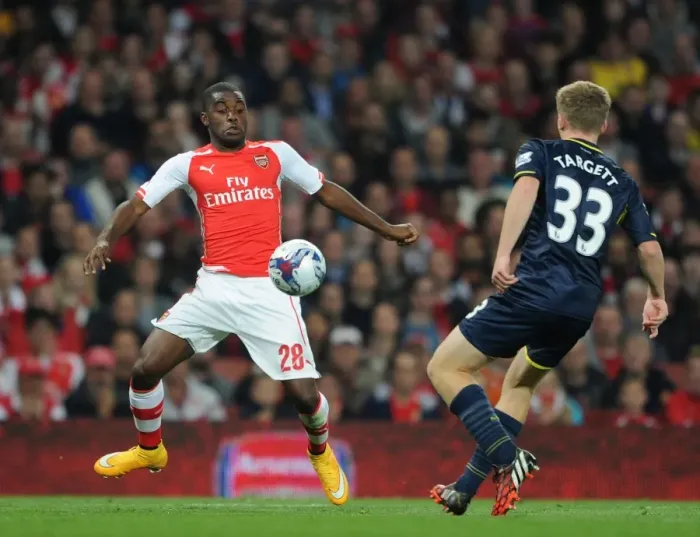 Framed Print : Arsenal's Joel Campbell Fends Off Southampton's Matt Targett in Capital One Cup Clash Framed Print : Arsenal's Joel Campbell Fends Off Southampton's Matt Targett in Capital One Cup Clash