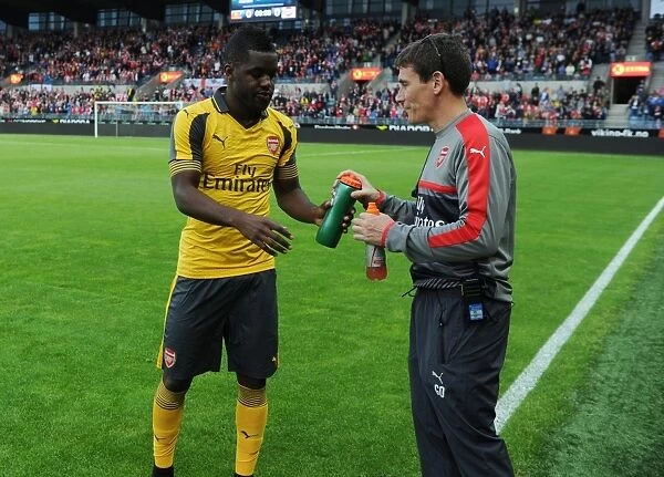 Arsenal's Joel Campbell Receives Medical Attention During Viking FK Friendly