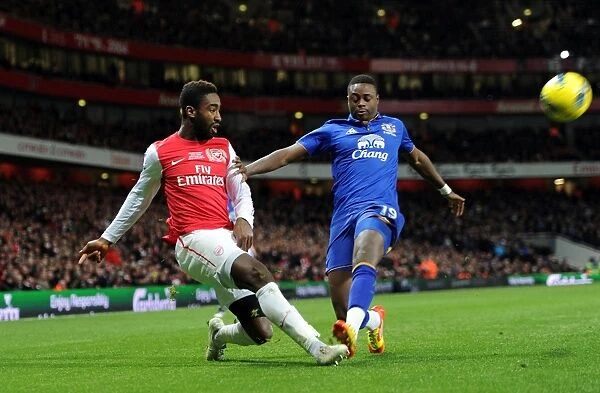 Arsenal's Johan Djourou Faces Off Against Everton's Magaye Gueye in Premier League Clash