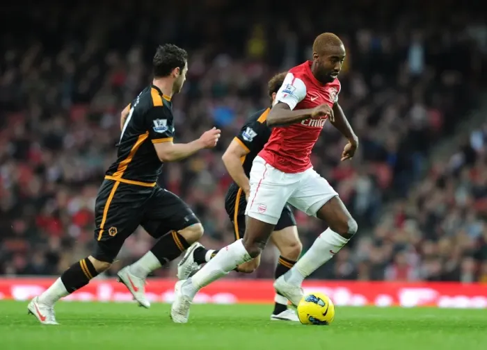 Framed Print : Arsenal's Johan Djourou Outruns Matt Jarvis in Arsenal vs. Wolverhampton Wanderers, Premier League 2011-2012 Framed Print : Arsenal's Johan Djourou Outruns Matt Jarvis in Arsenal vs. Wolverhampton Wanderers, Premier League 2011-2012