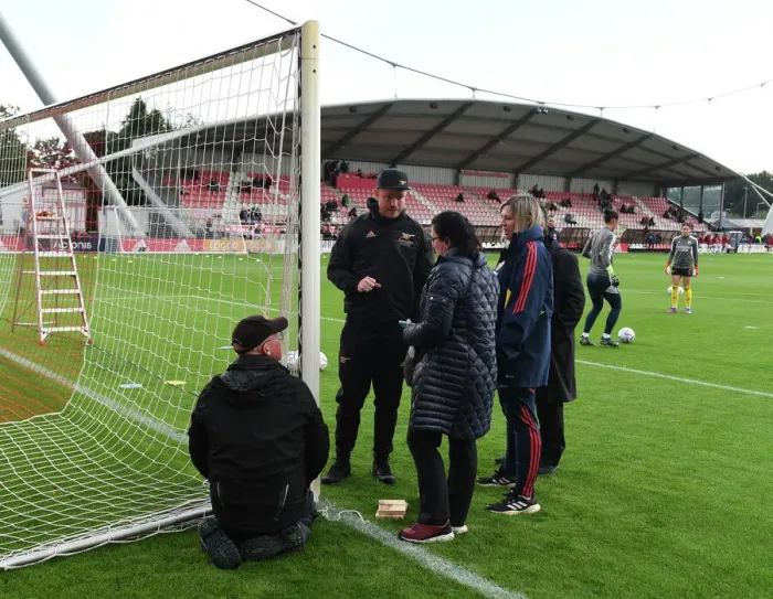 Framed Print : Arsenal's Jonas Eidevall Checks Goal Height Before Ajax Clash in UEFA Women's Champions League