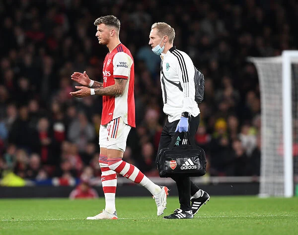 Arsenal's Jordan Reece Attends to Ben White's Injury During Arsenal vs Leeds United (Carabao Cup 2021-22)