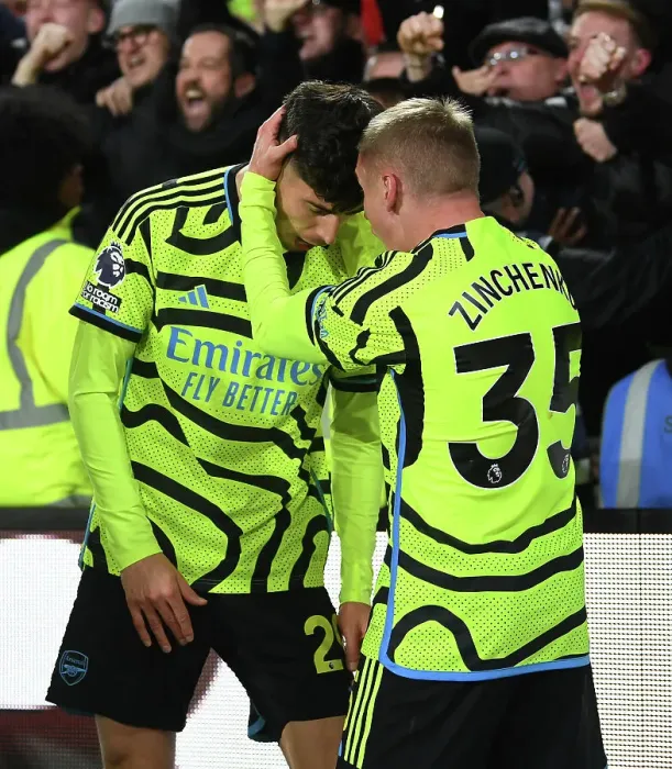 Framed Print : Arsenal's Jubilant Moment: Havertz and Zinchenko Celebrate Goal vs Brentford, Premier League 2023-24