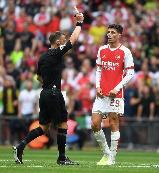 Arsenal's Kai Havertz Receives Yellow Card in FA Community Shield Clash Against Manchester City (2023-24)