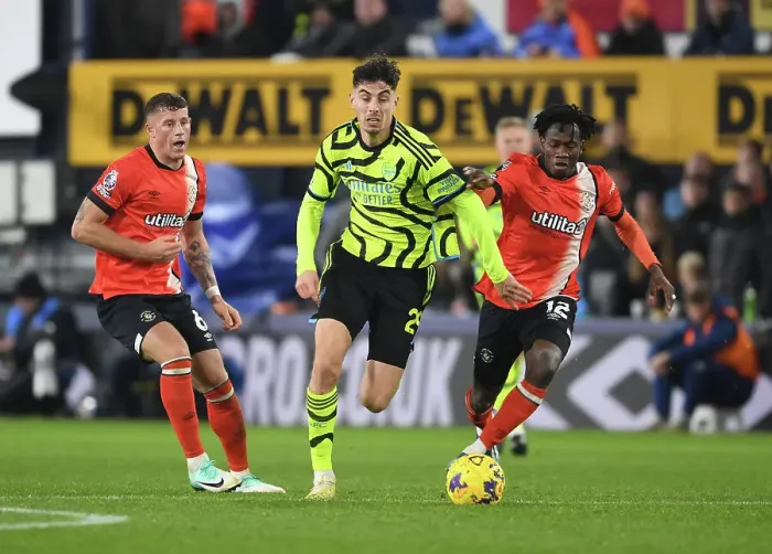 Framed Print : Arsenal's Kai Havertz Scores Past Luton's Kabore and Barkley in Premier League Clash (Luton Town vs Arsenal 2023-24) Framed Print : Arsenal's Kai Havertz Scores Past Luton's Kabore and Barkley in Premier League Clash (Luton Town vs Arsenal 2023-24)