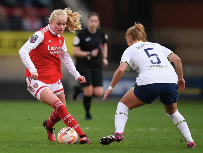 Framed Print : Arsenal's Kathrine Kuhl Overpowers Tottenham's Molly Bartrip in FA Women's Super League Showdown
