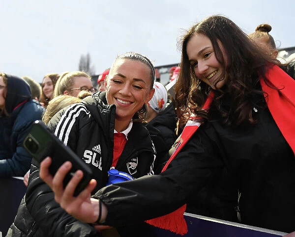 Arsenal's Katie McCabe Celebrates Victory with Fan: Selfie Moment after Arsenal Women's Win over Everton FC