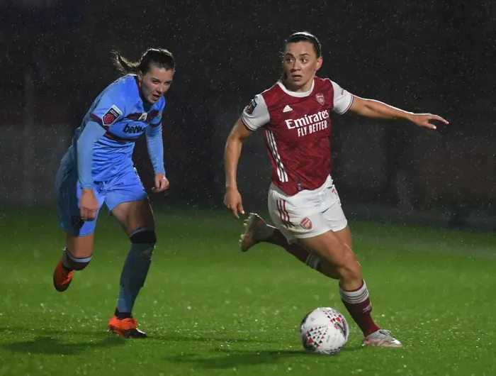 Framed Print : Arsenal's Katie McCabe Fights for Possession in Empty FA WSL Stadium Against West Ham United Women (2021)
