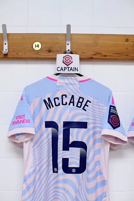Framed Print : Arsenal's Katie McCabe Prepares for Liverpool Clash: Captain's Armband and Leadership in Women's Super League
