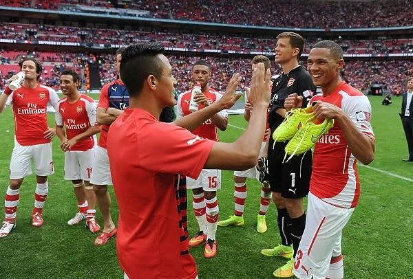 Arsenal's Kieran Gibbs and Alexis Sanchez Celebrate FA Community Shield Victory over Manchester City