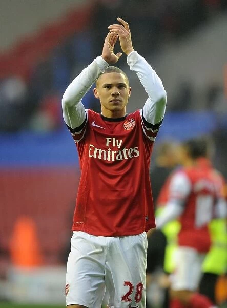 Arsenal's Kieran Gibbs Celebrates with Fans after Wigan Victory