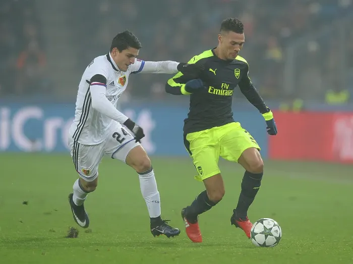 Framed Print : Arsenal's Kieran Gibbs Clashes with Basel's Mohamed Elyounoussi in 2016-17 UEFA Champions League Framed Print : Arsenal's Kieran Gibbs Clashes with Basel's Mohamed Elyounoussi in 2016-17 UEFA Champions League