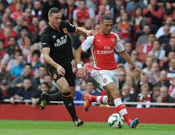 Arsenal's Kieran Gibbs Clashes with Hull's James Chester in Premier League Showdown