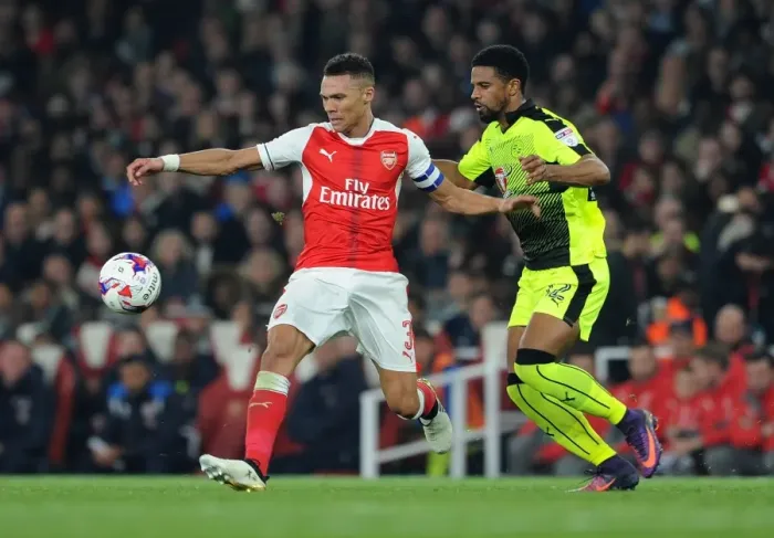 Framed Print : Arsenal's Kieran Gibbs Clashes with Reading's Garath McCleary in EFL Cup Showdown Framed Print : Arsenal's Kieran Gibbs Clashes with Reading's Garath McCleary in EFL Cup Showdown