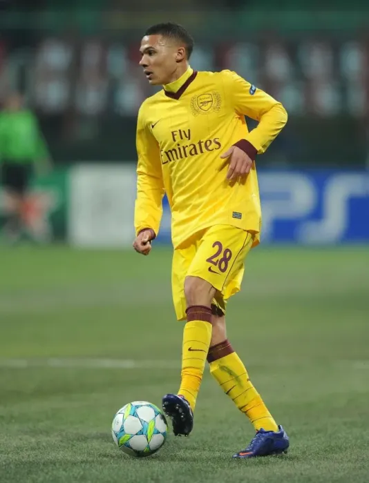 Framed Print : Arsenal's Kieran Gibbs Faces Off Against AC Milan in the 2011-12 UEFA Champions League Framed Print : Arsenal's Kieran Gibbs Faces Off Against AC Milan in the 2011-12 UEFA Champions League