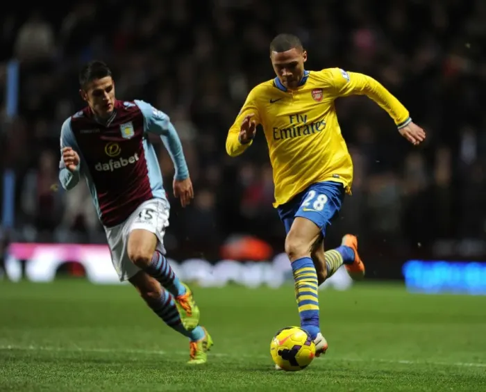 Framed Print : Arsenal's Kieran Gibbs Faces Off Against Aston Villa's Ashley Westwood in Premier League Clash Framed Print : Arsenal's Kieran Gibbs Faces Off Against Aston Villa's Ashley Westwood in Premier League Clash